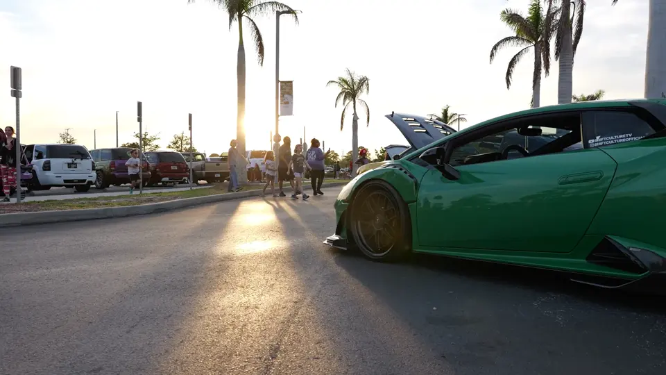 A green custom sports car displayed at a previous Shift Culture event